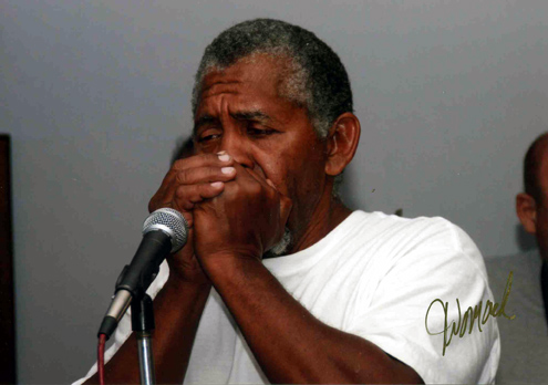 Harmonica Clyde playing at M'Dears